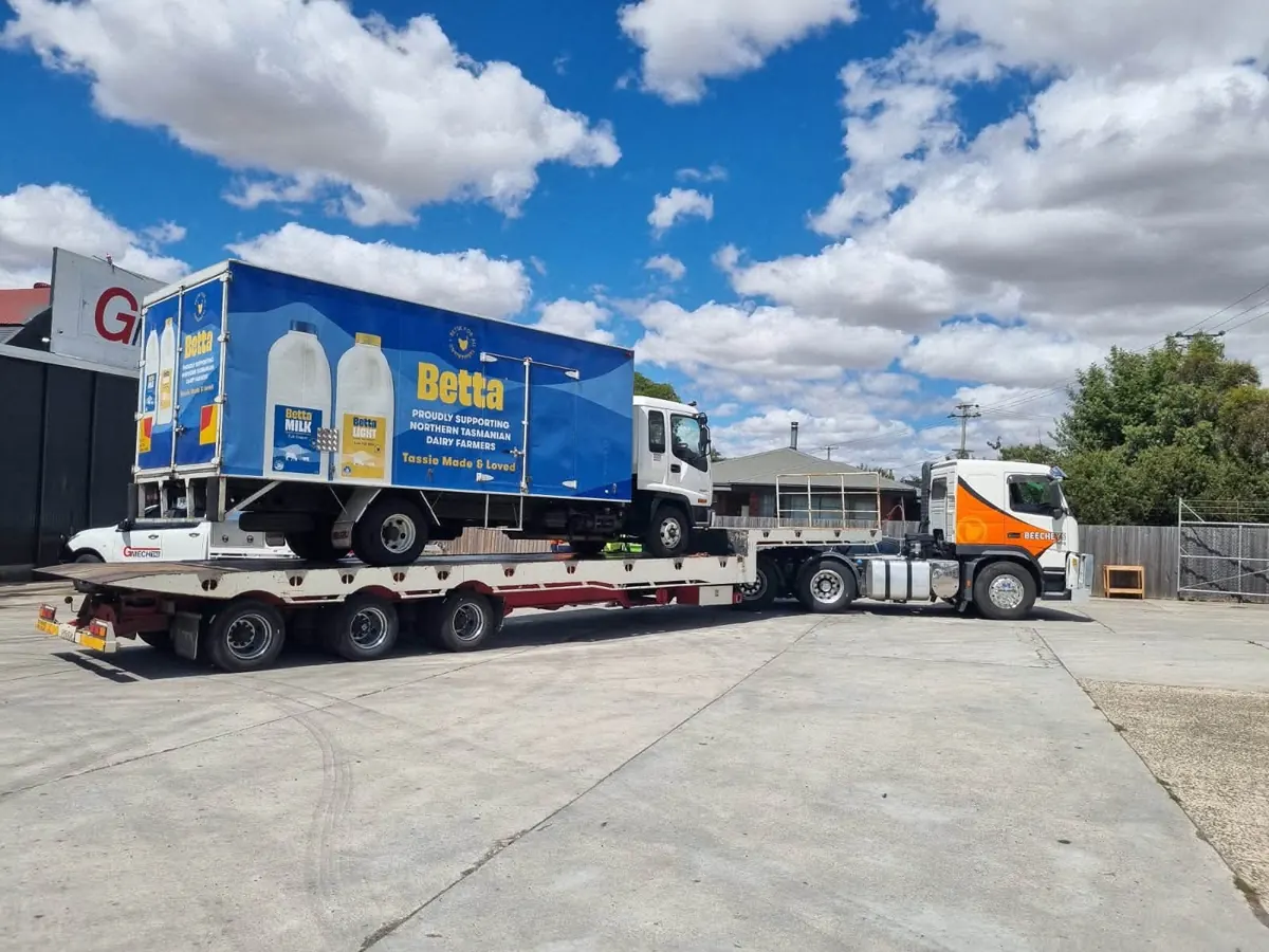 A Beecheys Towing truck loaded and ready to depart