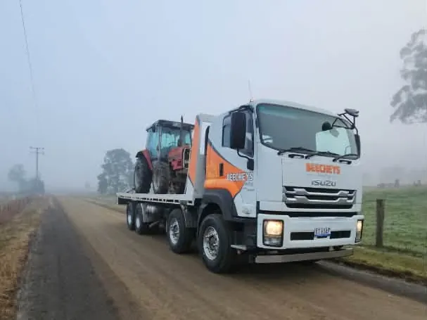Beecheys Towing crew securing a load in Launceston