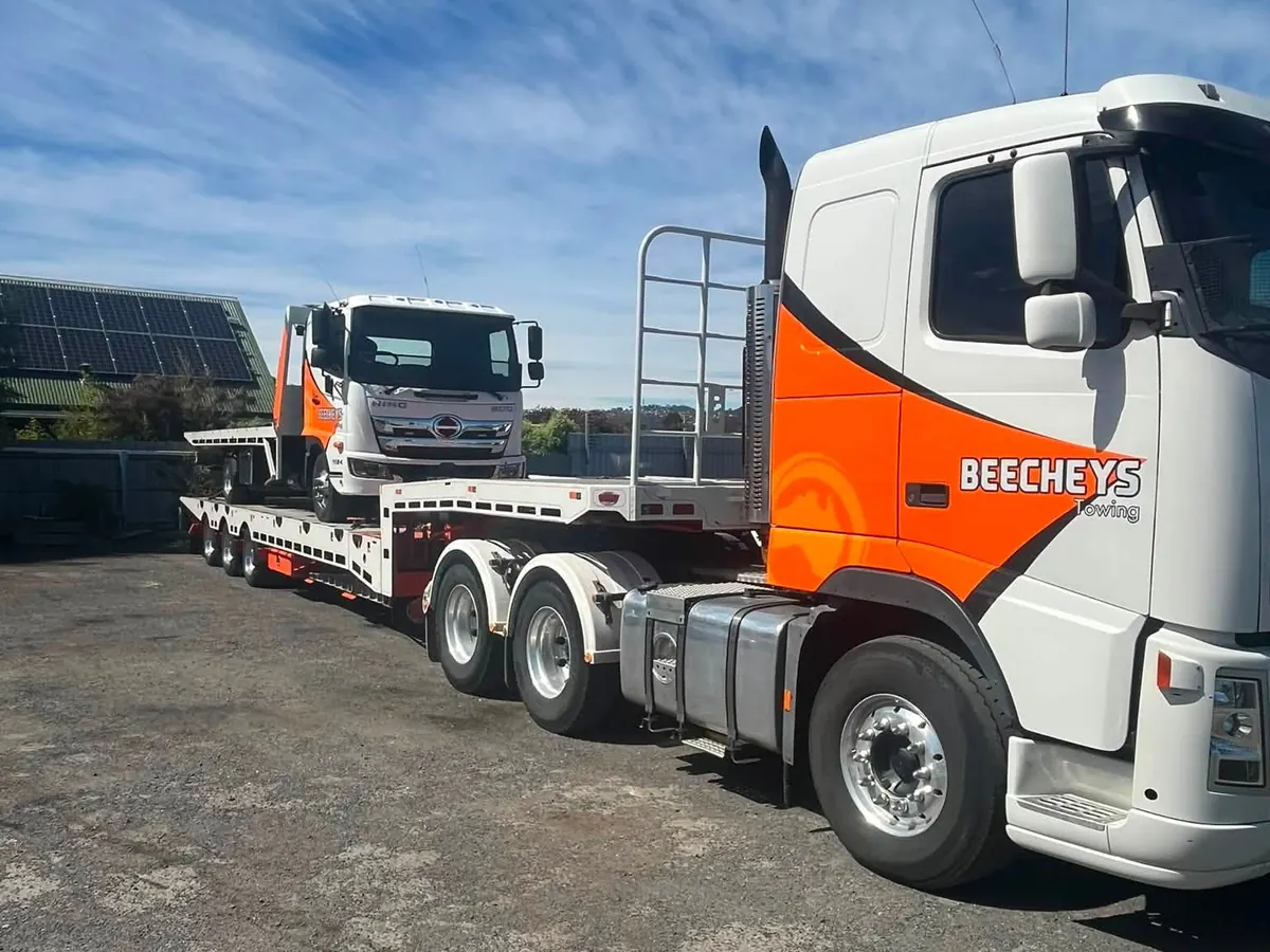 A Beecheys Towing truck on a Tasmanian country road
